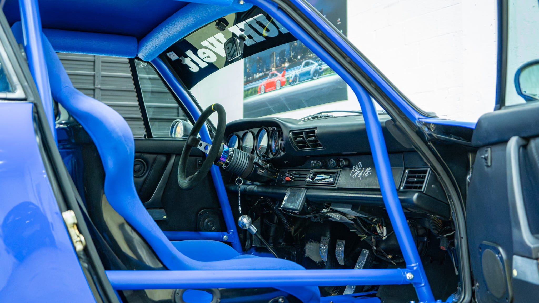 1989 Porsche 911 RWB – Backdate – 3.2L – G50 – Sunroof Delete – Smooth Fender Only 56k Miles – Bahama Blue – Custom Headers/Exhaust full
