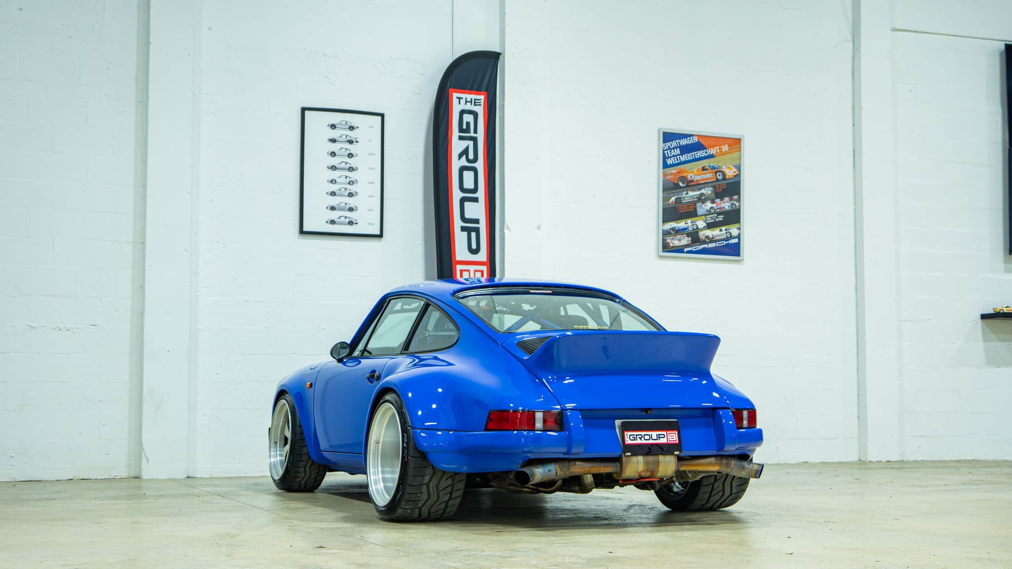 1989 Porsche 911 RWB – Backdate – 3.2L – G50 – Sunroof Delete – Smooth Fender Only 56k Miles – Bahama Blue – Custom Headers/Exhaust full