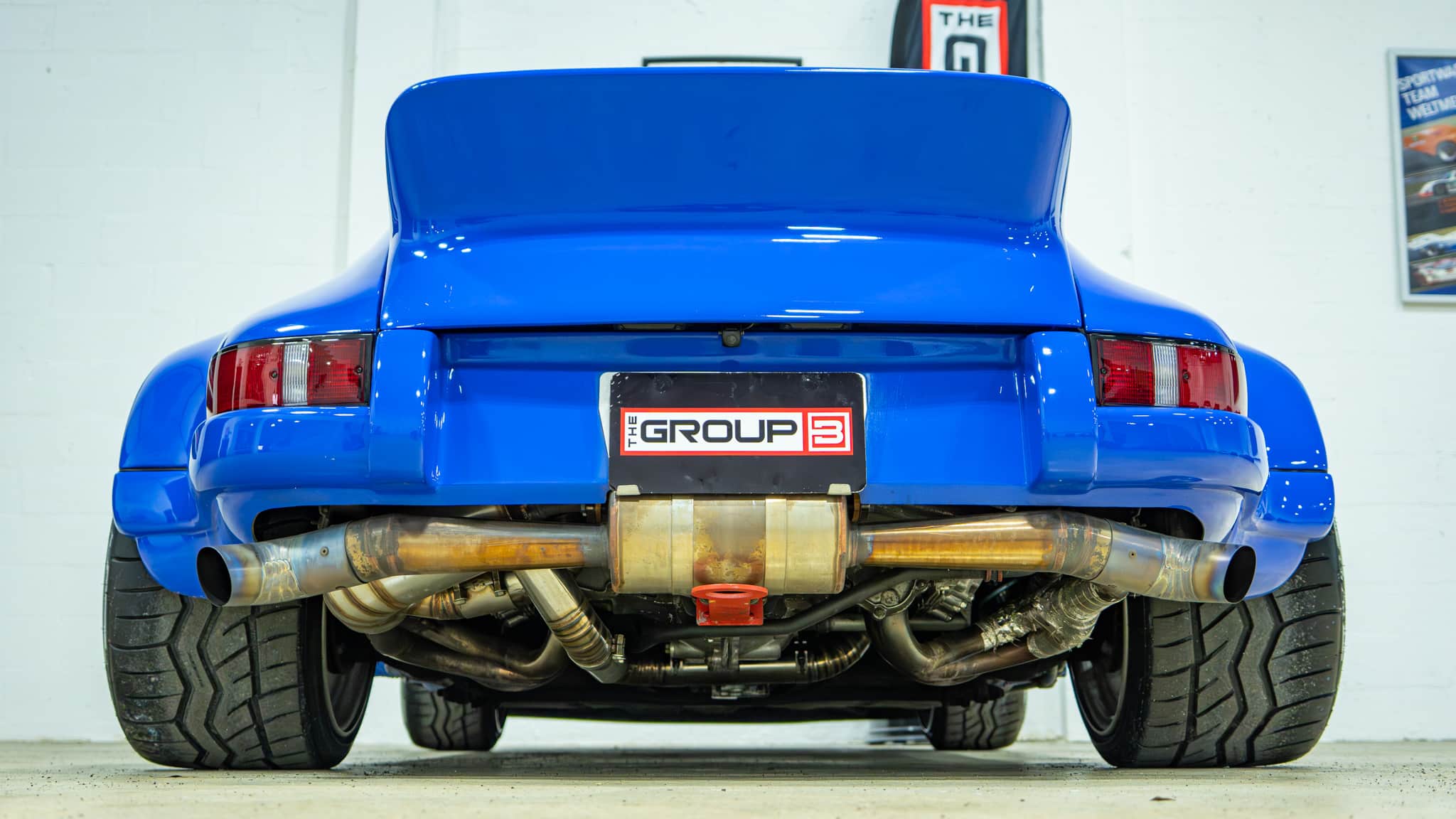 1989 Porsche 911 RWB – Backdate – 3.2L – G50 – Sunroof Delete – Smooth Fender Only 56k Miles – Bahama Blue – Custom Headers/Exhaust full